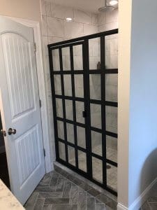 Shower enclosure with grid layout