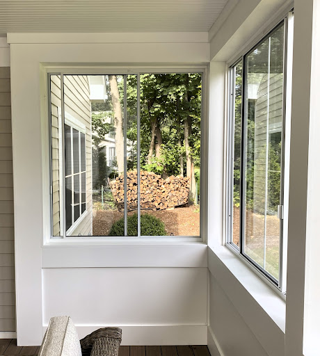 Three season porch enclosure with storm windows in Worcester, MA