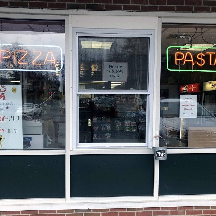 Fixed storefront glass was converted into a takeout window Framingham, MA
