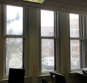 Keeping an office space warm and toasty with discreet interior storm windows while maintaining the gorgeous wavy glass windows. Taunton, MA