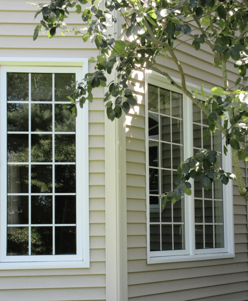 Casement double pane window with grids.