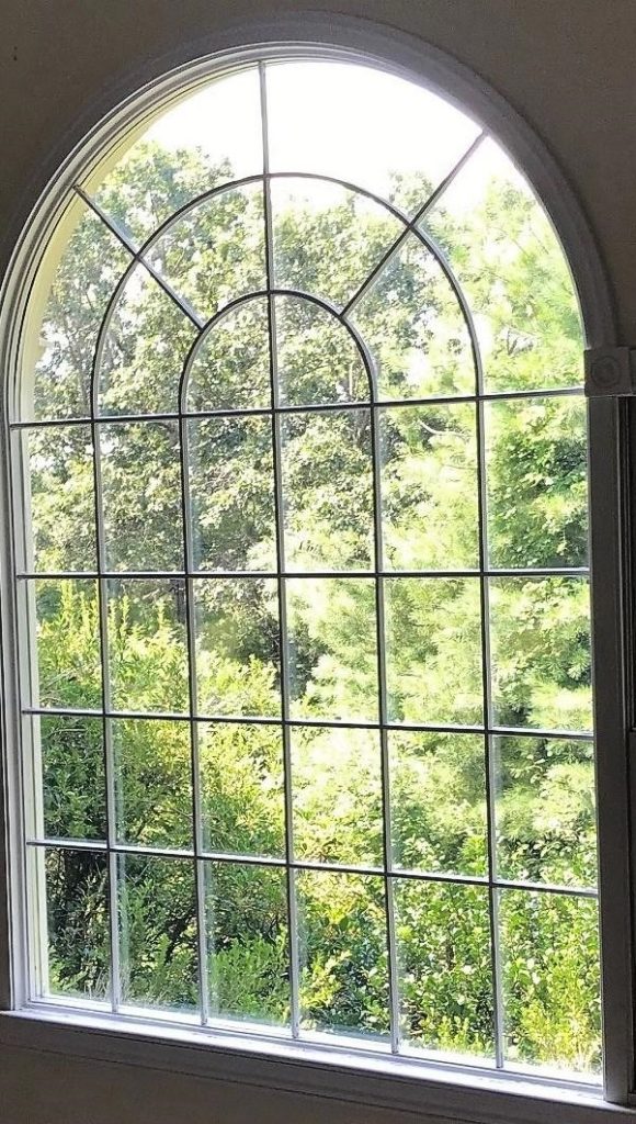 Replacement arched window glass with intricate grid work